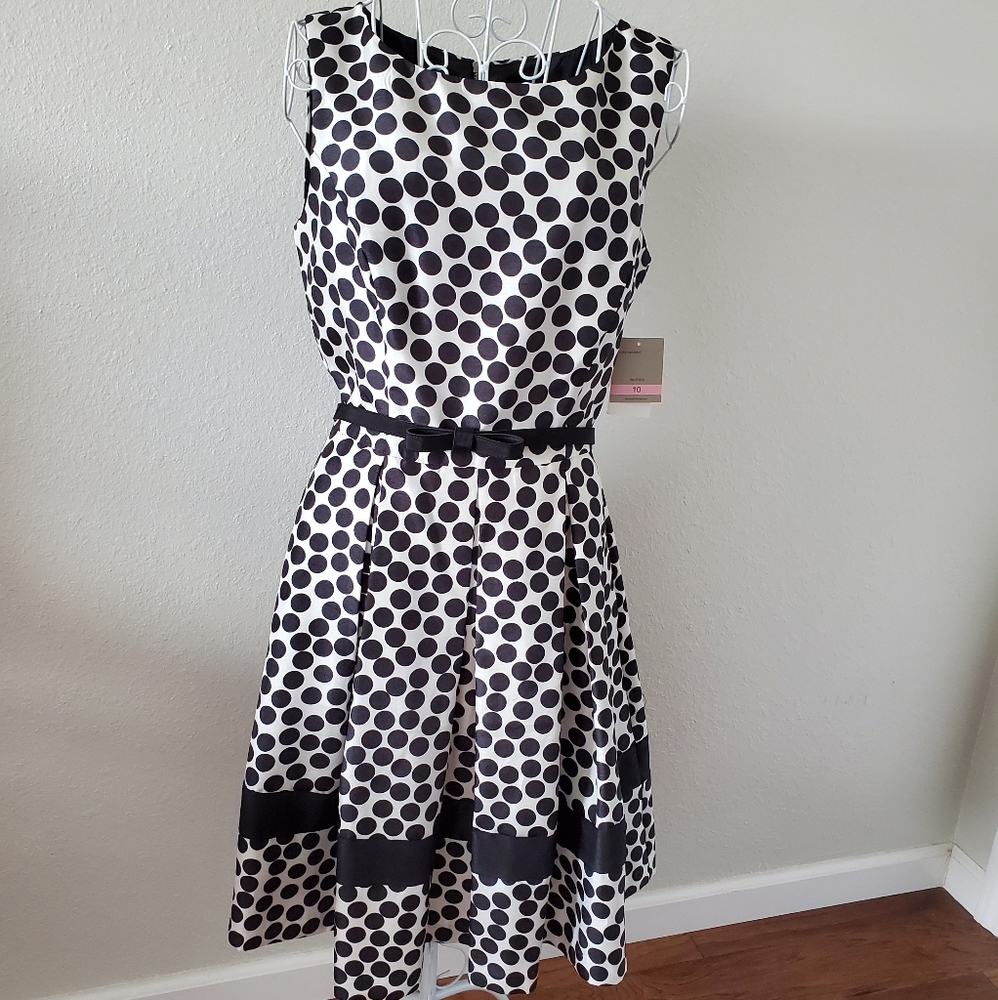 Black & White polkadot dress with a black belt.